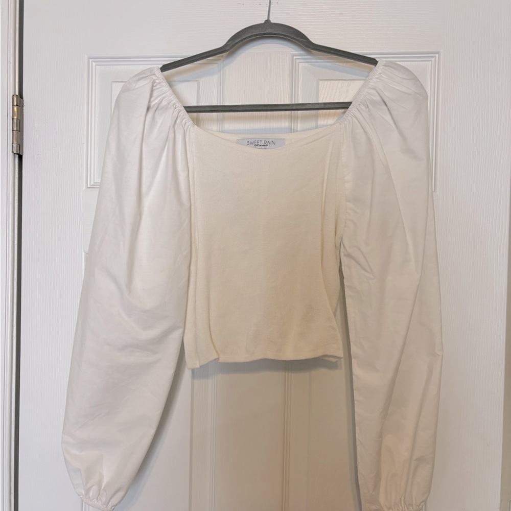 White sweater with puffy sleeves